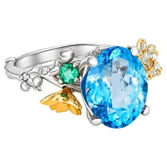 Asymmetric Floral Blue Topaz RIng, SIlver, Gold