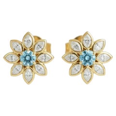 Boucles d'oreilles clous en or jaune 14 carats avec topaze en forme de marguerite