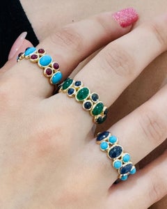 Bague en or jaune 18 carats sertie d'une aigue-marine ovale et d'un saphir bleu rond