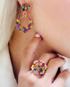 Bague en or 18 carats avec fleur et pierres précieuses