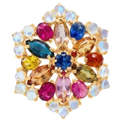 Bague en or 18 carats avec fleur et pierres précieuses