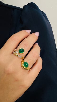 Anello bypass con smeraldo in oro 18 carati