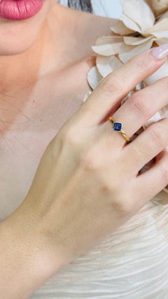 Anello Solenne in oro 18 carati con tanzanite
