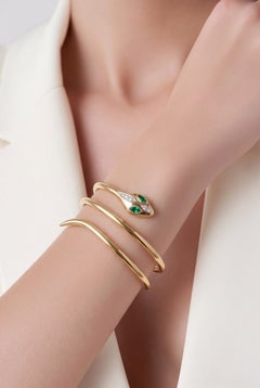 Pulsera tipo brazalete con forma de serpiente, de oro amarillo de 18 quilates con esmeraldas y diamantes, de Tresor