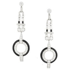 Boucles d'oreilles pendantes en platine, cristal de roche, onyx et diamants