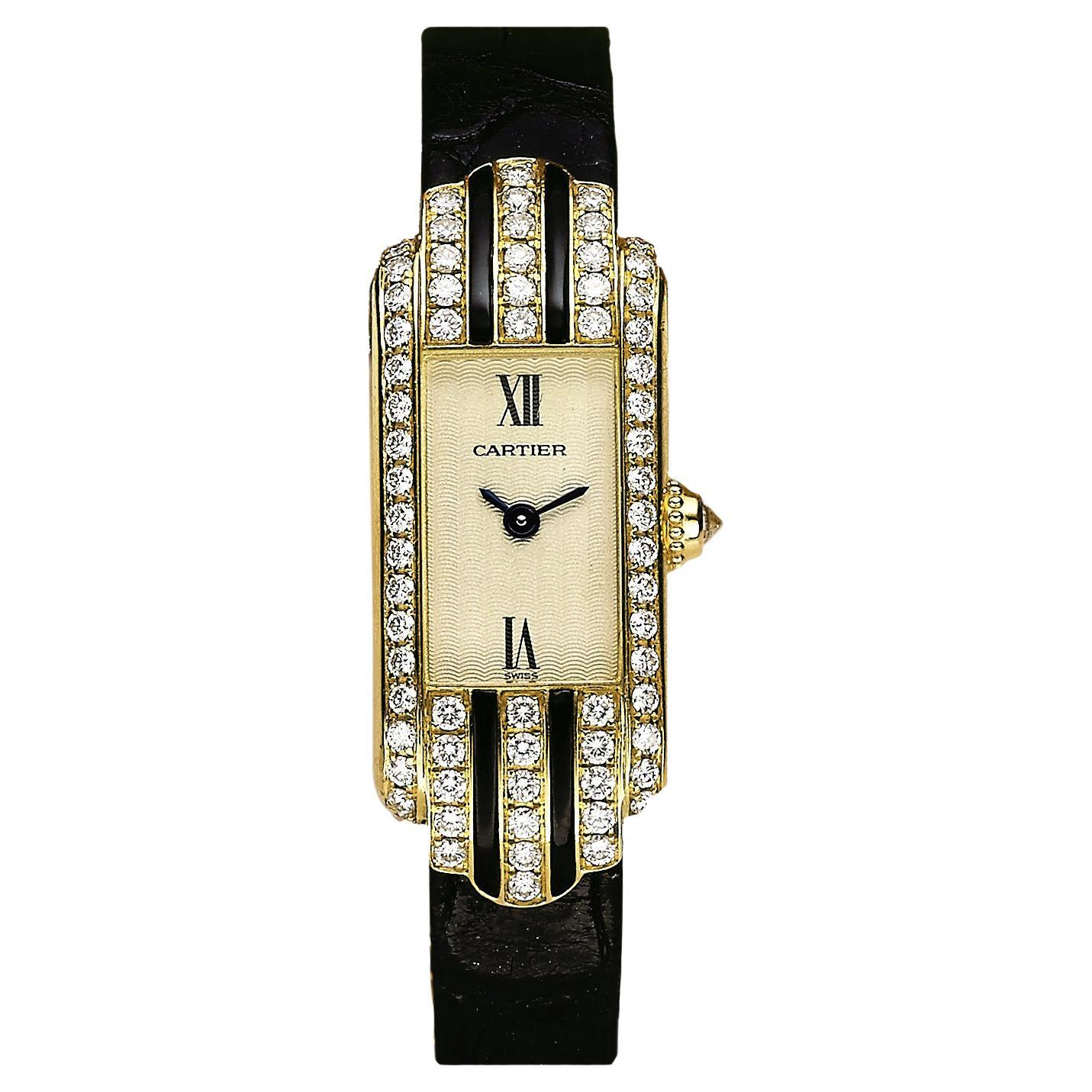 Cartier lady’s Deco-style Tank wristwatch (ref. 1380), featuring a quartz movement; guilloche cream-toned dial with black painted Roman numeral 'XII' and 'VI', as well as blued-steel epee hands; and, 14.4mm x 38mm 18k yellow gold case, framed by
