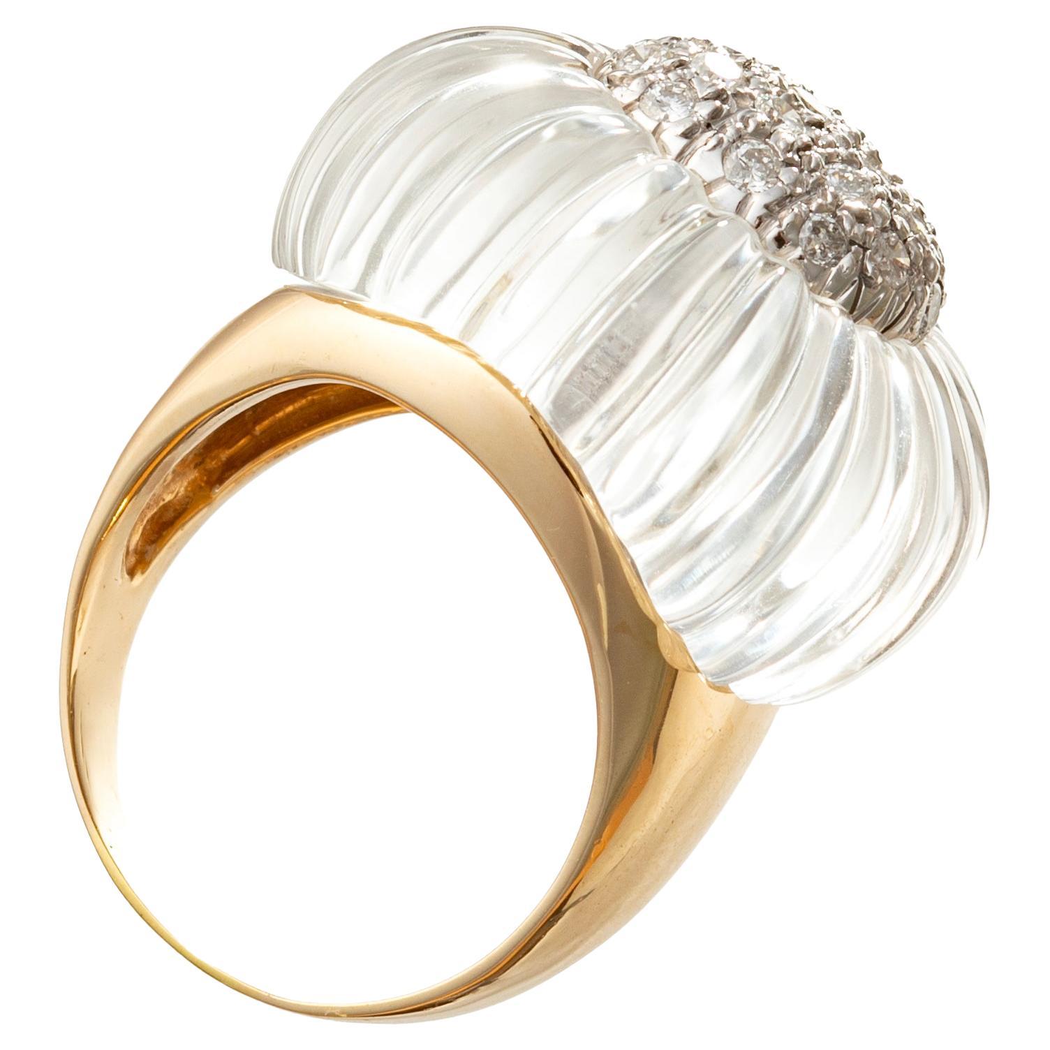 MAZ handmade cocktail ring in 14k gold, featuring a cushion-shaped carved rock crystal centering a white gold section pavé-set with round brilliant-cut diamonds and polished yellow gold shank.  Rock crystal measuring 23 x 21.5mm. Twenty-two diamonds