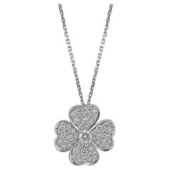 Van Cleef & Arpels, petite broche pendentif Cosmos en or blanc 18 carats avec diamants