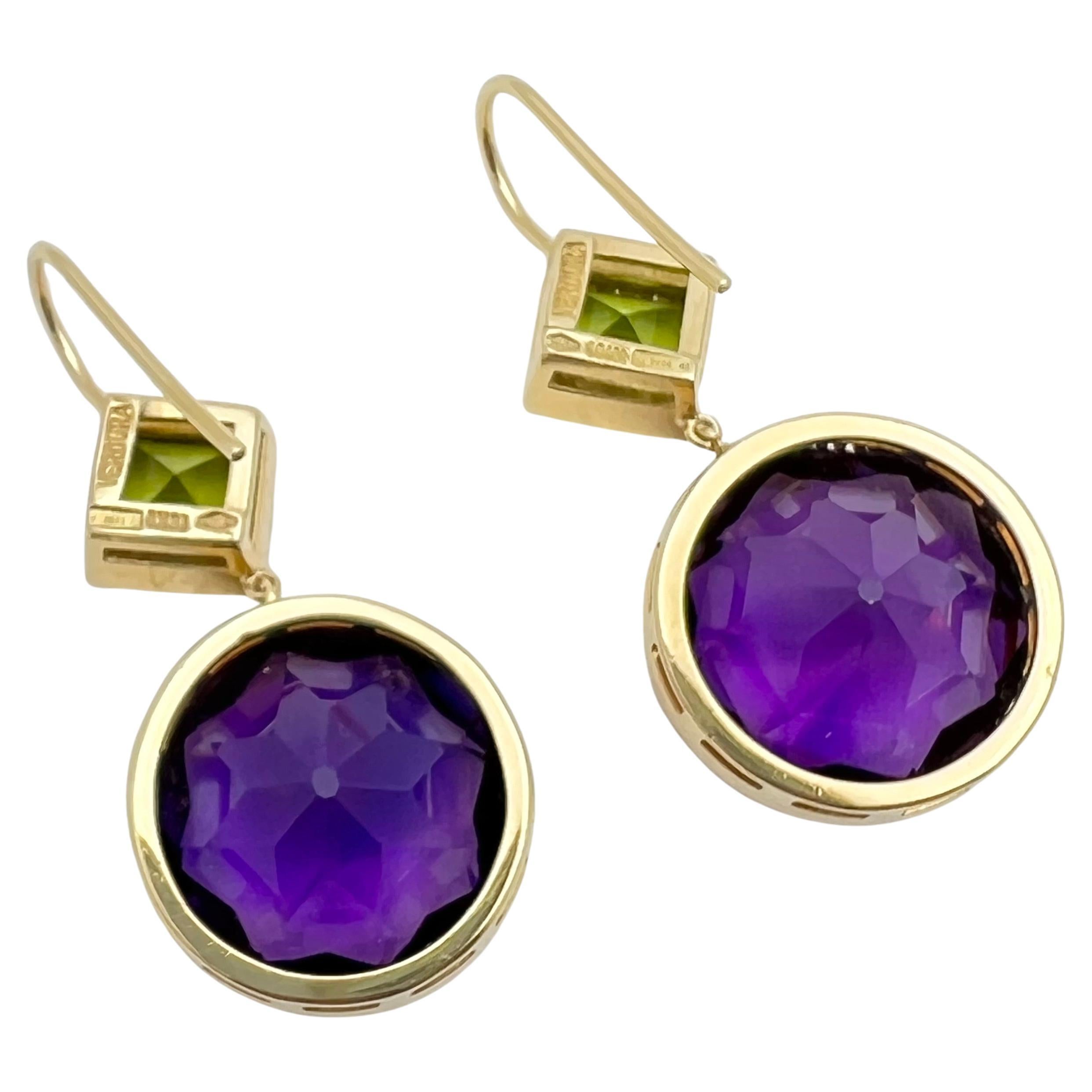 Verdura Byzantine pendant earrings, featuring a top section bezel-set with a square faceted peridot (6.7mm) suspending a bezel-set round faceted amethyst drop (16.50mm).  Fluted detail edge on the bezel border.  French wires for pierced ears. 