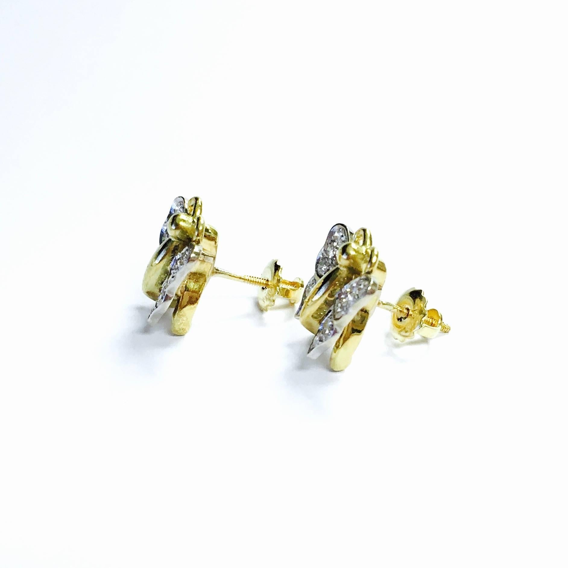 Gorgeous butterfly diamond earrings, crafted in 18K white and yellow gold, set with 32 single cut diamonds. Approximate total weight: 0.35ct, Color: F-G, Clarity: VS1-VS2. Each earring measures: 13 x 13 mm ( 1/2 x 1/2 inch)
Post with screw back.