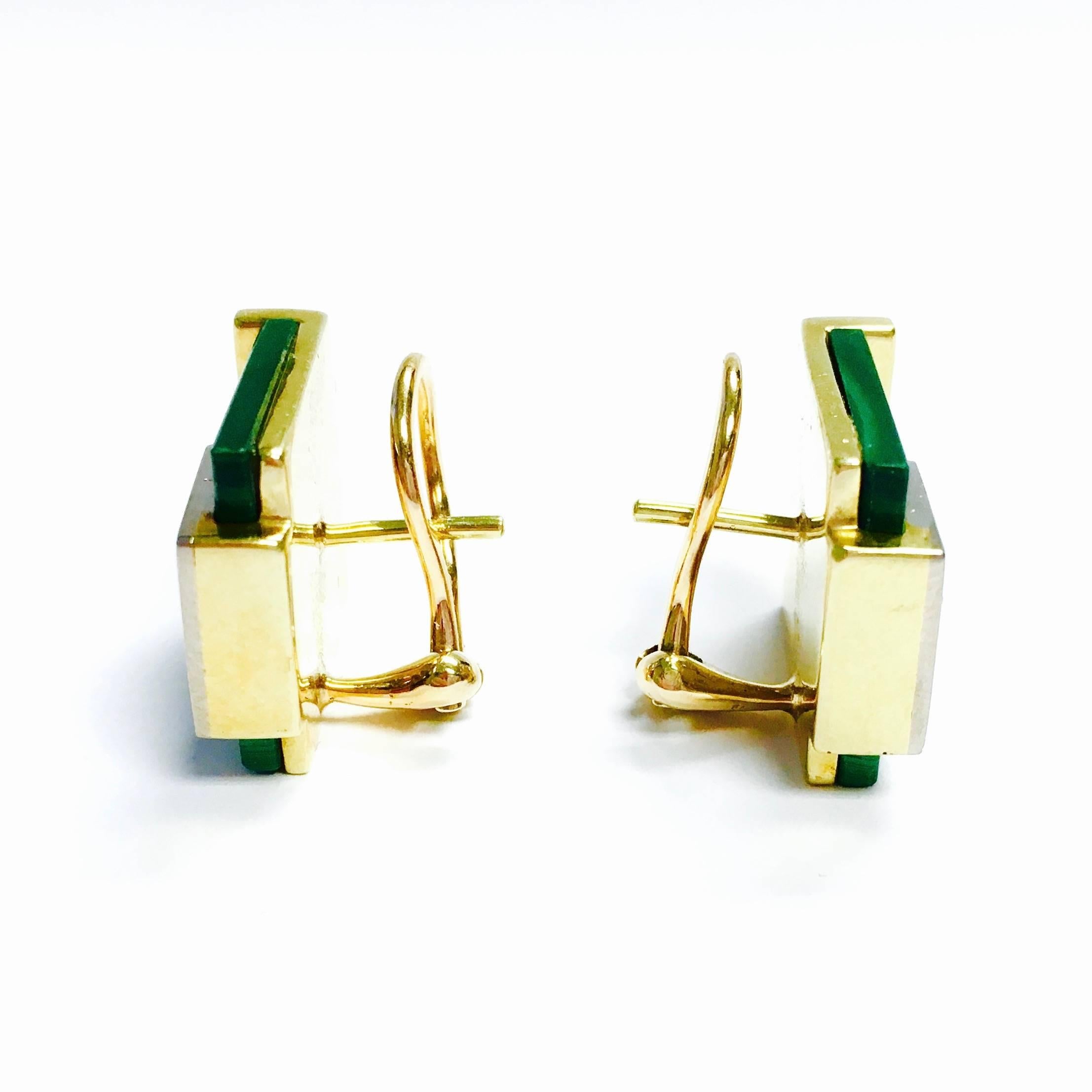 Carfted in 18kt yellow gold, each earring features a three-tiered layering design of gold topped with malachite, finished with a cubic design of pave' diamond cluster. 
Diamonds: 32 round brilliant cut diamonds, approximate total weight: 0.70ct.,