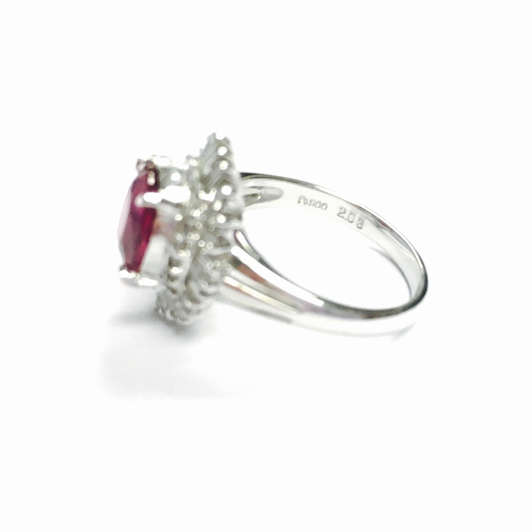 Featuring a 2.03ct oval cut no heat ruby solitaire, surrounded by a bezel of round brilliant and baguette cut diamonds, total weight: 0.50ct (stamped inside the shank). Color: F-G, Clarity: SI1-I1
Size: 6
Weight: 6.7 grams
GIA report number: