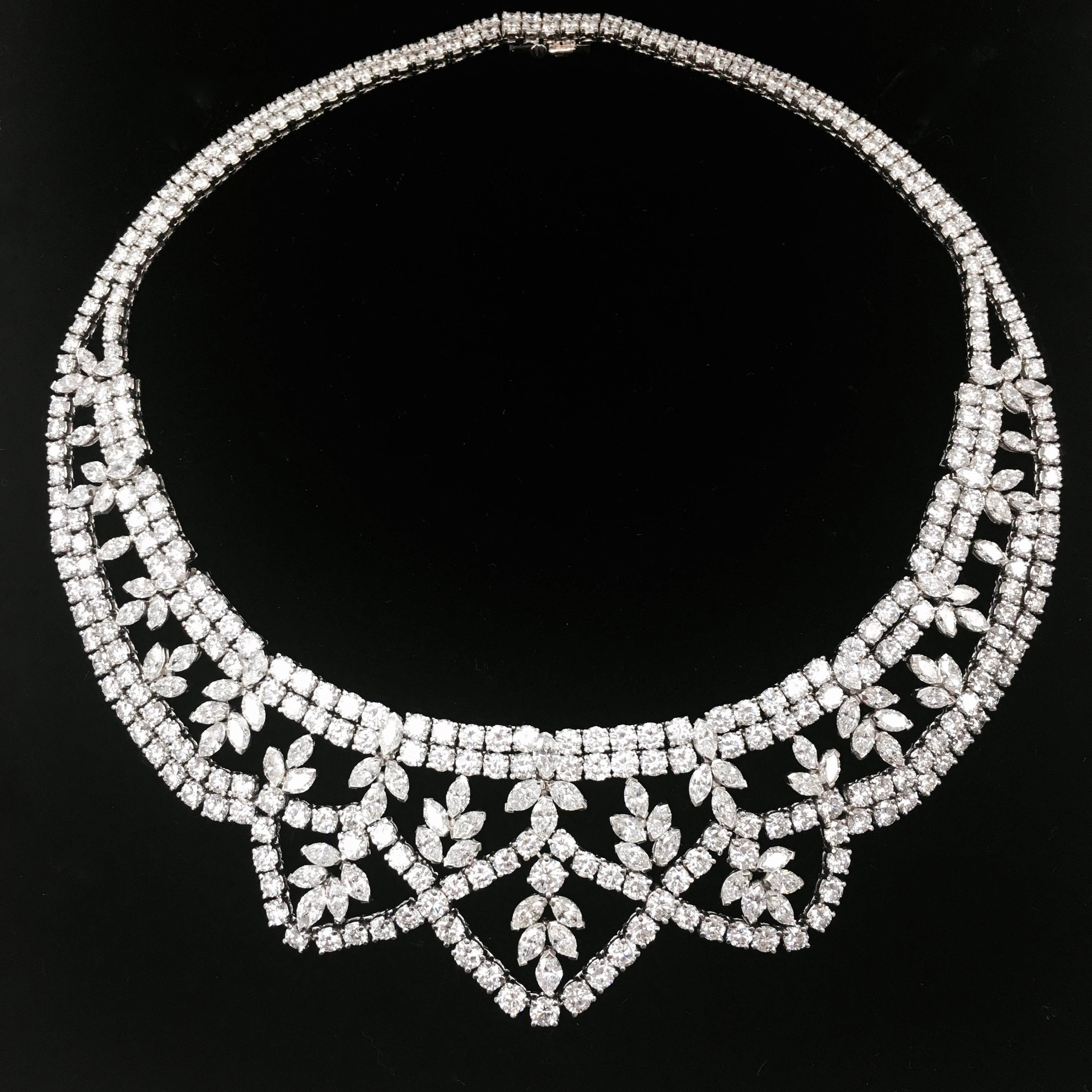 Elegand platinum diamond garland style necklace set with 431 round brilliant and marquise cut sparkling, high quality diamonds. 
Approximate total diamond weight: 59 carats, Color: F-G, Clarity: VS1-VS2
Length: 15 inches
Weight: 113.2 grams