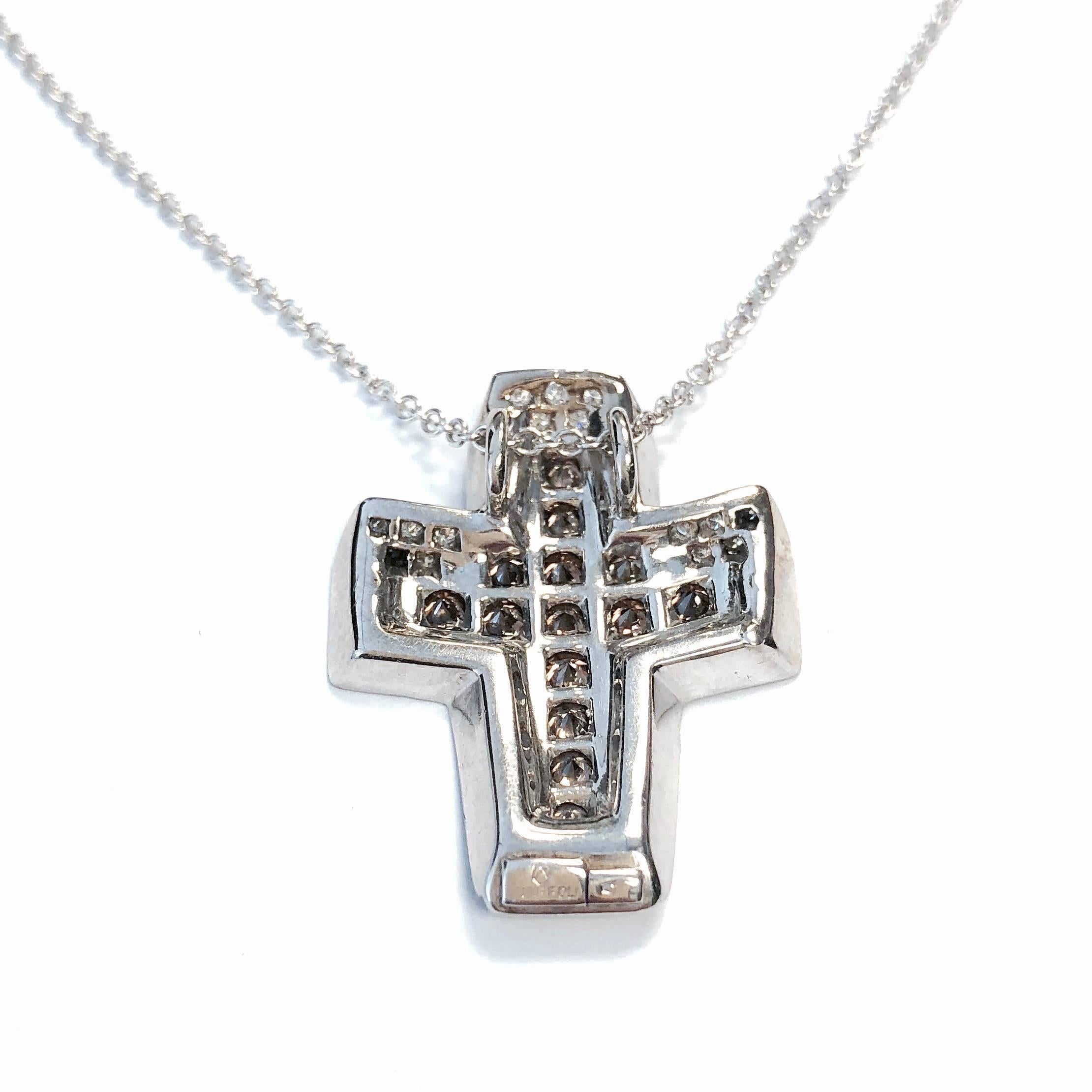 From the famous house of Andreoli, featuring a curved 3 dimensional cross design. The pendant is crafted in 18K white gold and set with 56 round brilliant cut diamonds, approximate total weight of 3.00 carats. Color: F-G for white diamonds and light