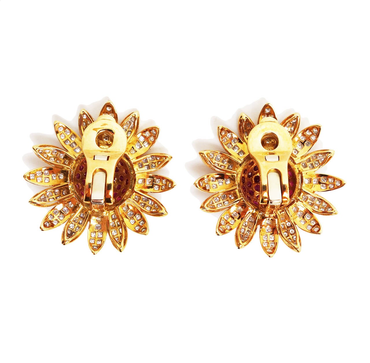 Gorgeous 18K yellow gold ruby & diamond flower clip-on earrings. High quality stones and excellent workmanship. 62 round cut vibrant color rubies approx. 3.50ct total weight, and 240 round brilliant cut diamonds approx. 3.50ct total weight, color: :