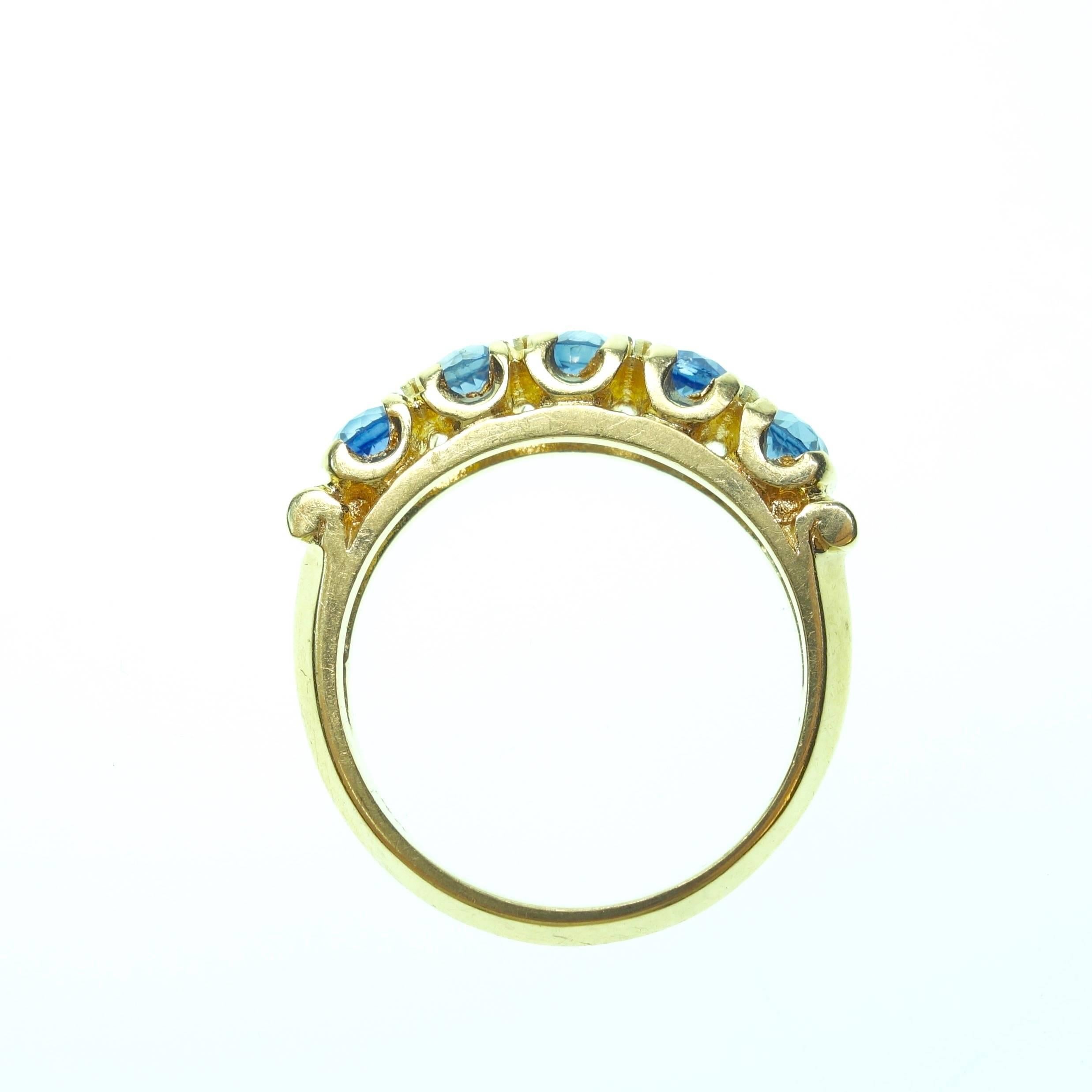 Gorgeous Victorian 14K yellow gold ring featuring five round cut highly saturated, brilliant blue sapphire solitaires. Approximate total weight: 1.75ct. Pictures don't give justice. Size: 6 (sizable)
Weight: 3.5 grams