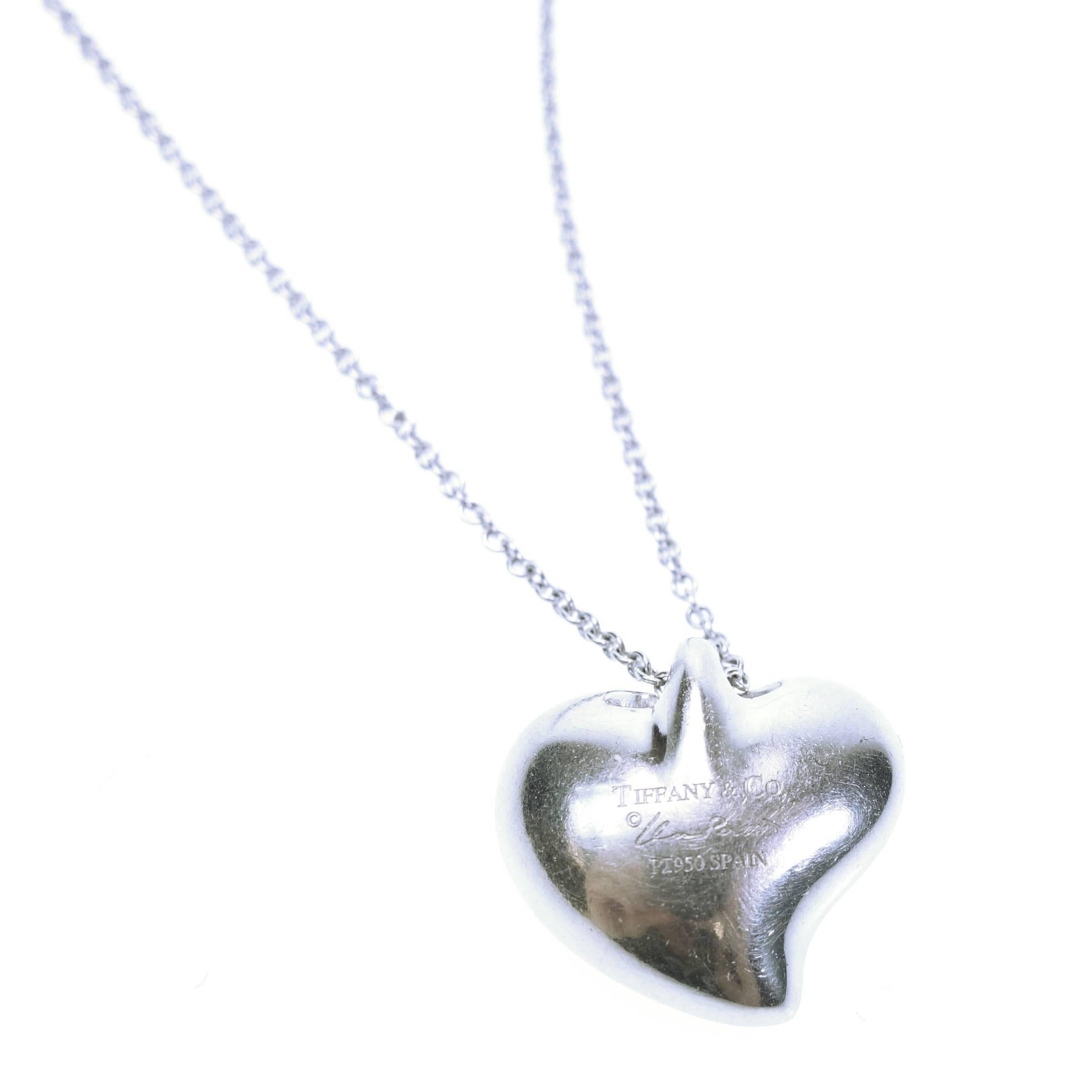 Rare Tiffany & Co. by Elsa Peretti pave' set diamond heart pendant and Platinum chain. 
Marked: TIFFANY&Co. Elsa Peretti PT950 SPAIN
Dimensions of the heart: 14 mm X 13.5 mm, depth: 6 mm. 
Total diamond weight: approx. 0.35ct.
Length: 15
