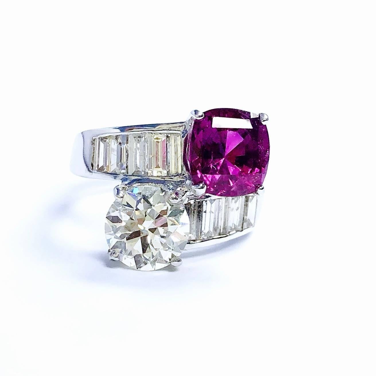 Crafted in 18K white gold, the ring features a Toe et Moi design with one cushion shaped 2.82ct no heat purple-pink sapphire (GIA 6173588942) and one old European cut 1.63ct diamond. Clarity: VS-2, Color: N (GIA 5172957876). Certificate number is