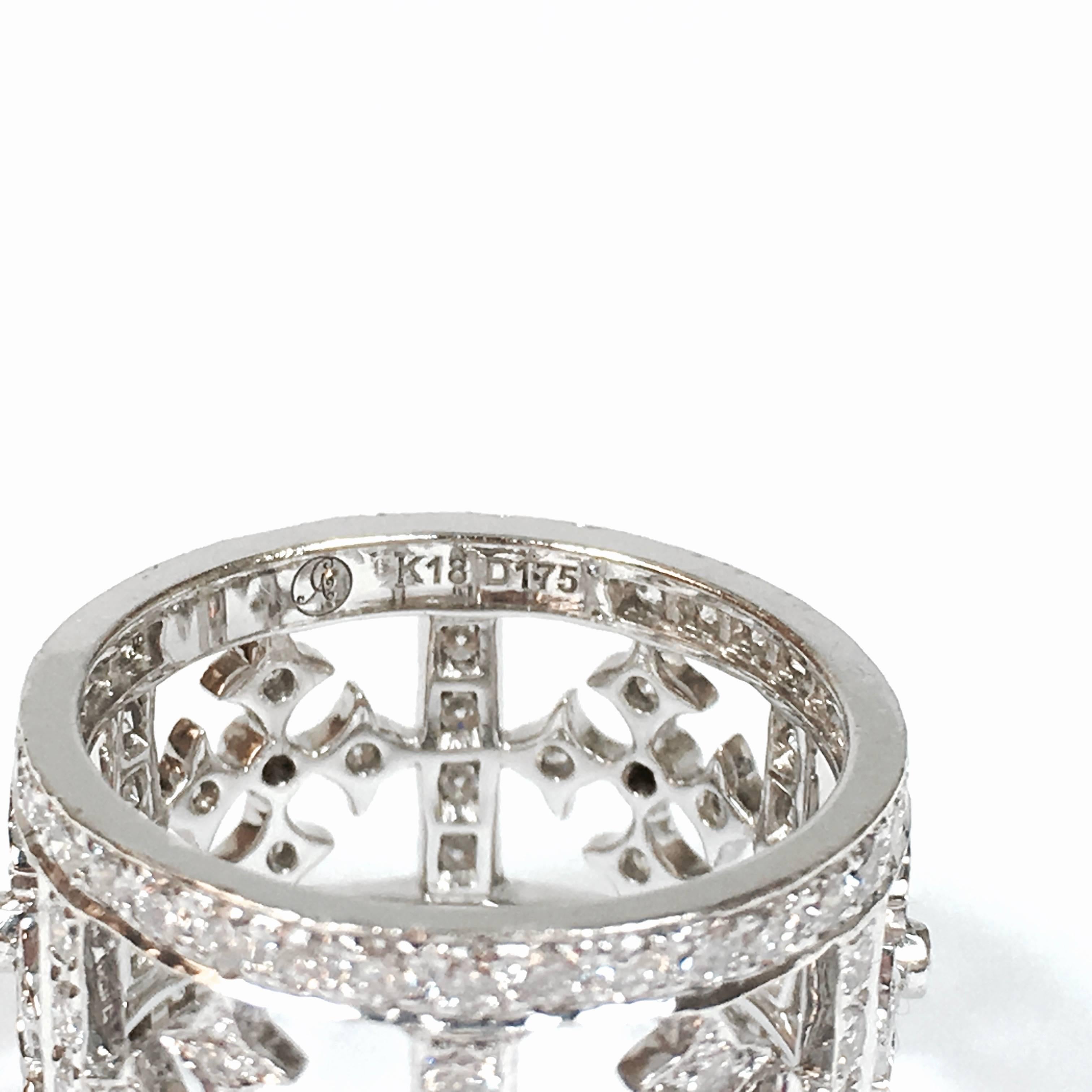 18K white gold eternity ring from designer Lauren K. Featurign a series of cascading diamond set maltese cross sections framed by diamonds.
Total diamond weight: 1.75 ct, Color: F-G, Clarity: VS1-VS2
Size: 5 3/4 (do not recommend sizing)
Width: