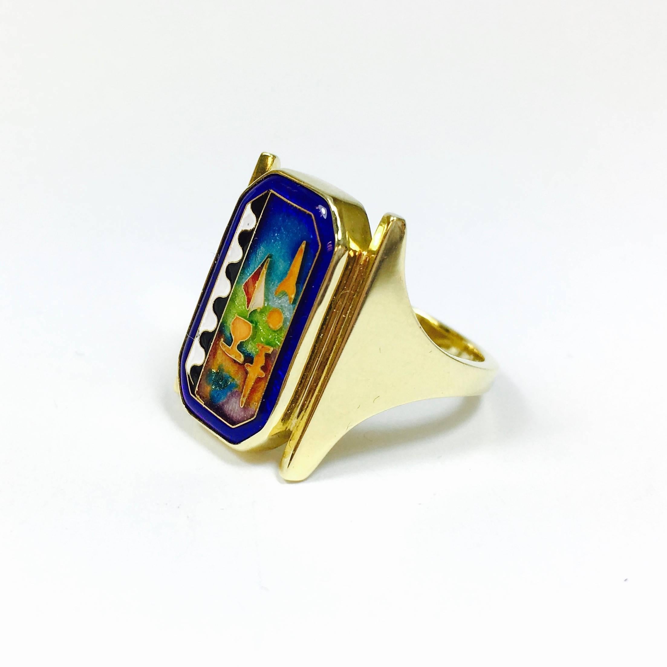 A fantastic piece of designer jewelry by the Berkeley, California company now known as MAGICK Fusager Design, Inc. This is earlier work from the 1988-2002 period and designed by in house artists Susan Demski and Falker Fusaiy. The 18K yellow gold