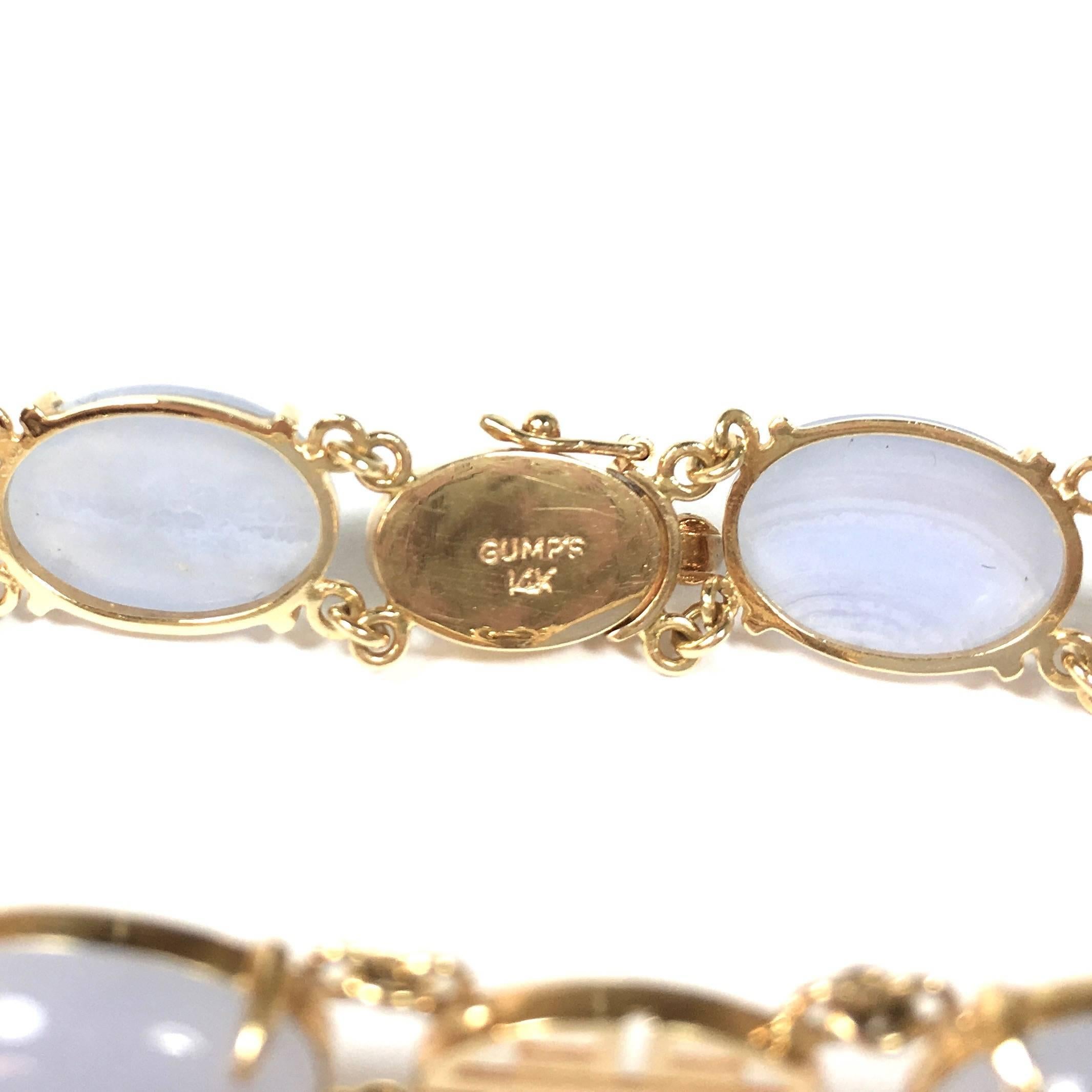 14K yellow gold Gump's San Francisco 6 stone 15x10mm oval cabochon blue lace agate bracelet.
Length: 7 inches
Marked: Gump's 14K
Weight: 15.0 grams