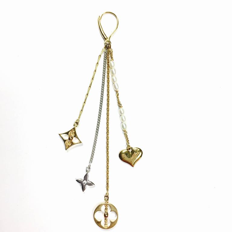 Louis Vuitton Monogram Pearl Gold Dangle Earrings at 1stdibs