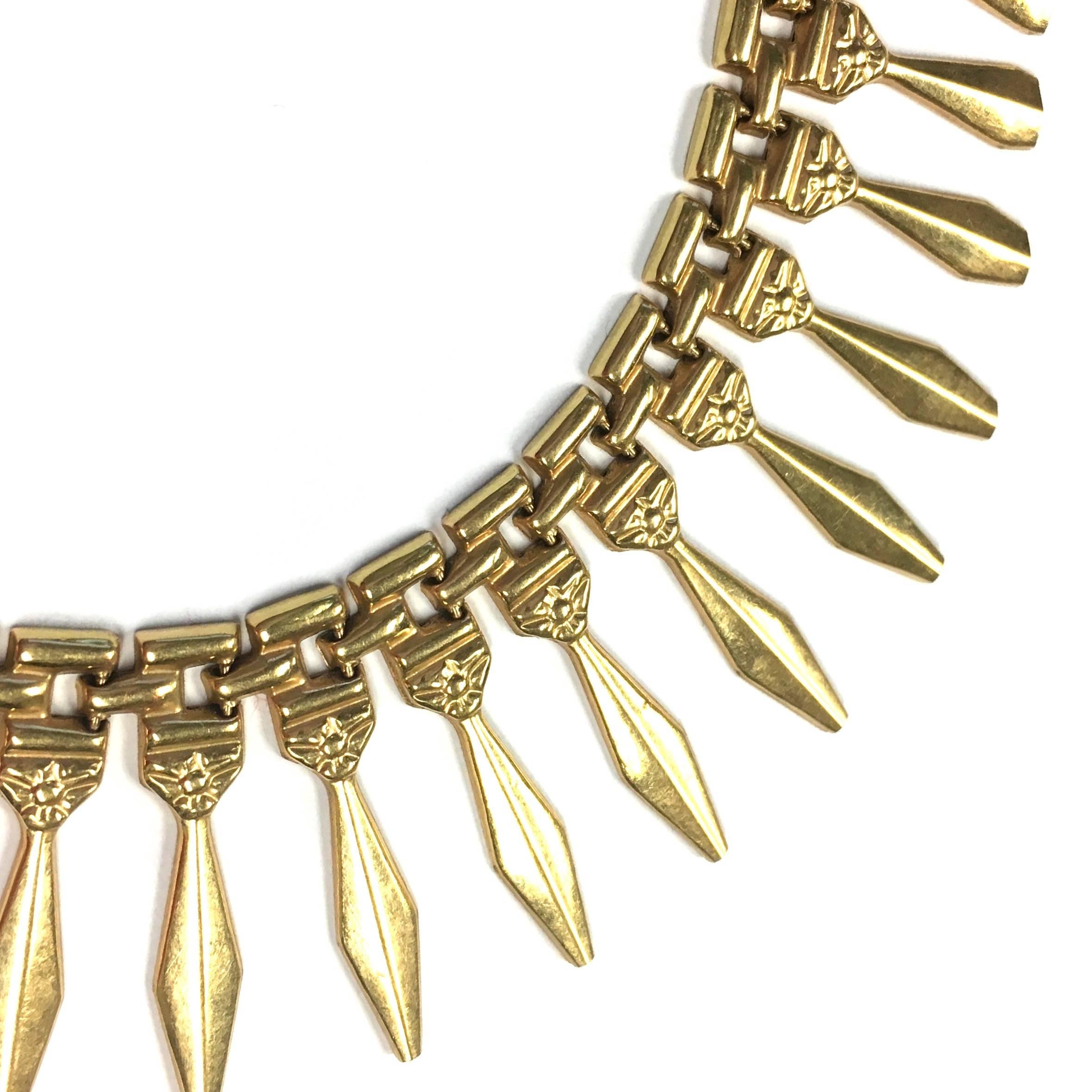 Gorgeous 18K yellow gold necklace decorated by graduating gold stylish links on the front. 
Marked with the french import gold mark and the italian manufacturer's hallmark. Circa 1960's. 
Length: 16 inches
Weight: 25.8 grams