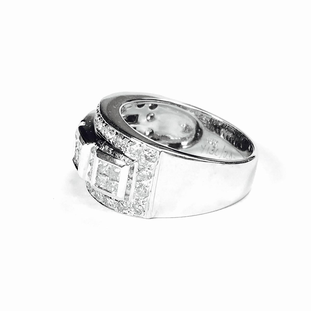 18K white gold band, measuring 10.5 mm on the front and 5 mm on the back, set with round brilliant and princess cut diamonds, approximate total weight: 1.00ct, Color: F-G Clarity: VS1-VS2
Size: 6.5
Weight: 10.3 grams