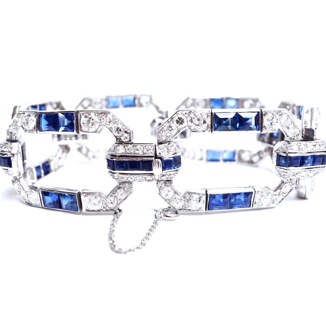 Magnificent Art Deco Platinum bracelet composed of a series of six sapphire and diamond set links. Each link measures: 28x20mm, the connecting links are 13x7mm. Length: 7.5 inches.
208 old european and single cut diamonds, approx. total weight of