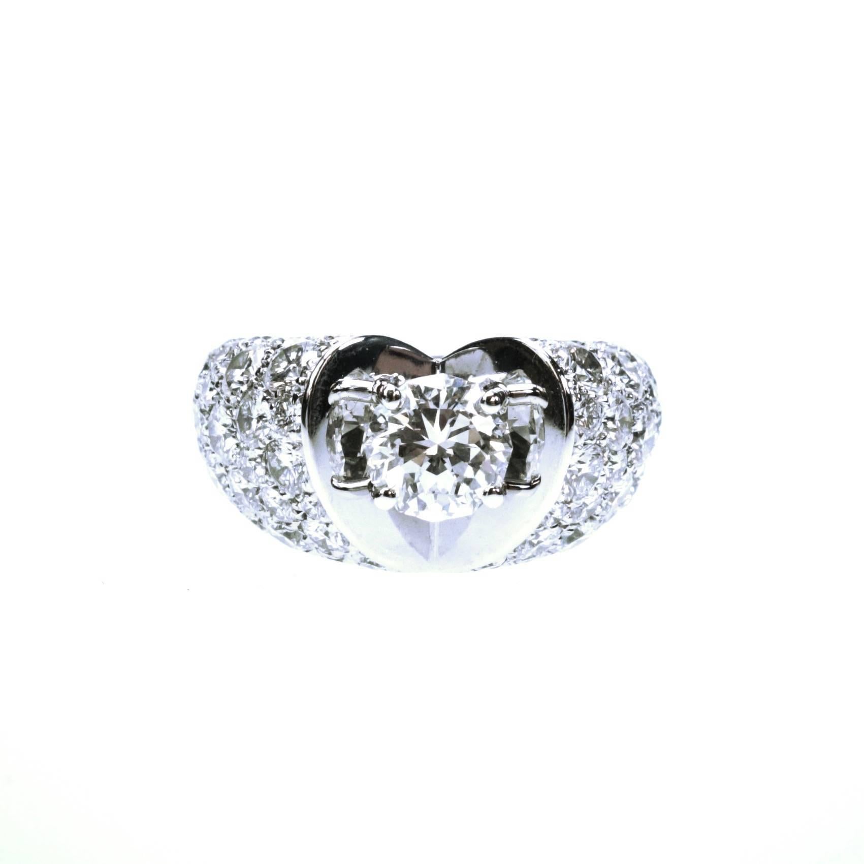 18K white gold and diamond Large Fancy Elite ring from the Escada Romance Collection. The center diamonds is a 1.27ct Escada cut with H color and VVS1 clarity.

The cut is an exclusive and original 12-sided dodecagonal cut with a unique