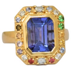 18K gold Tanzanite titanic stone ring with multi sapphires and diamonds