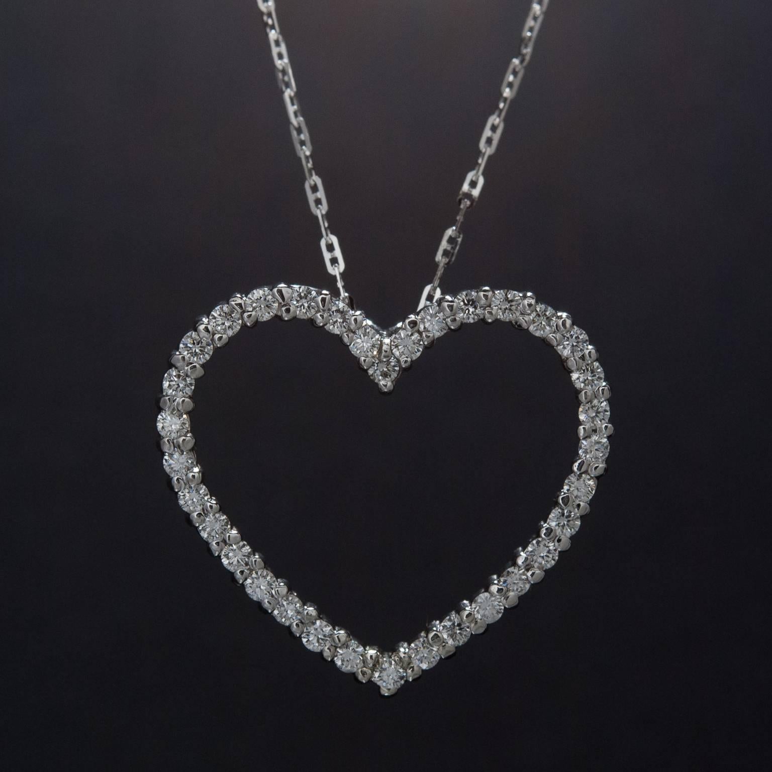 A gorgeous diamond pendant in the shape of a heart. This piece features 34 diamonds weighing a total of .53 carats and is set in 14k white gold.