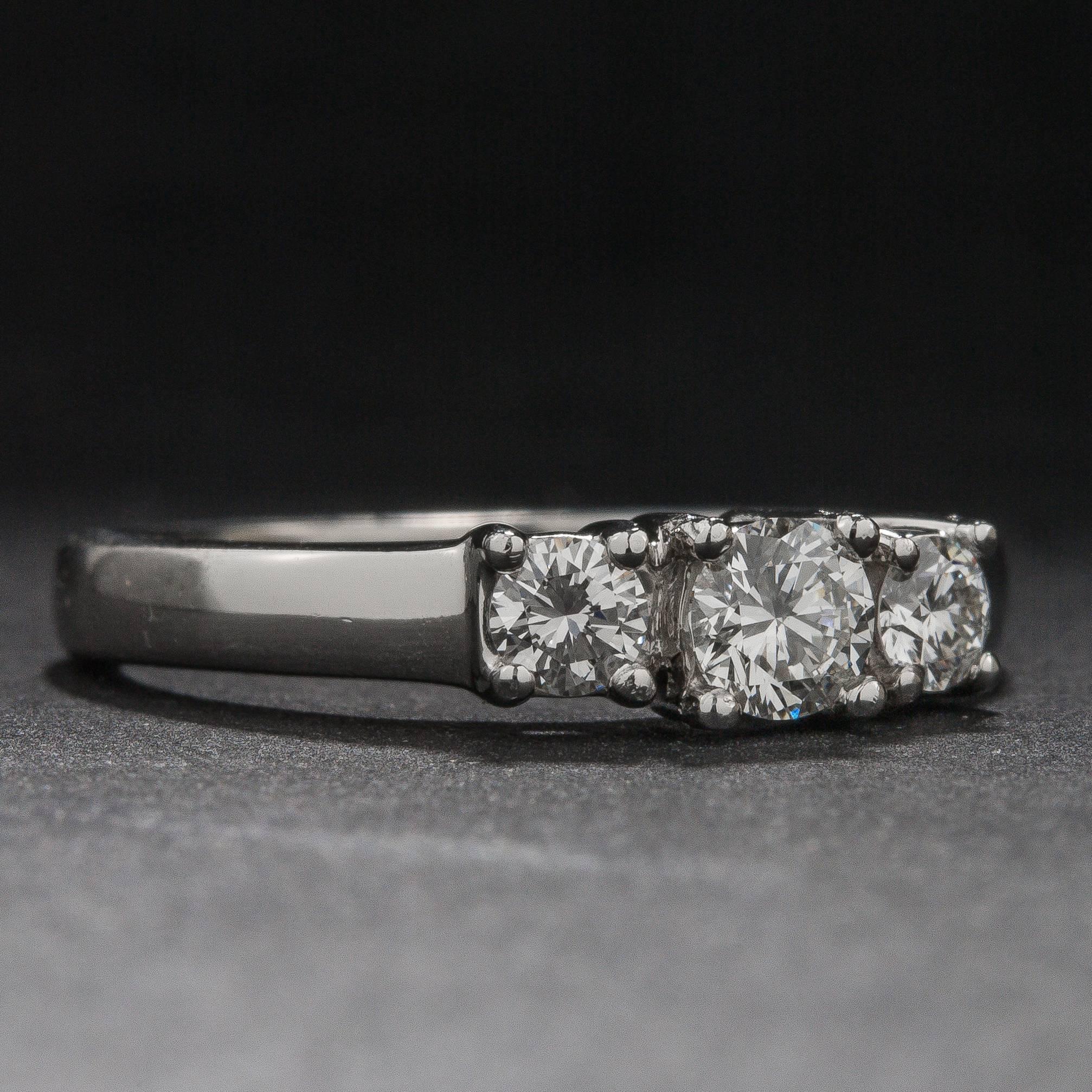 Contemporary .71ctw Three-Stone Diamond Ring For Sale
