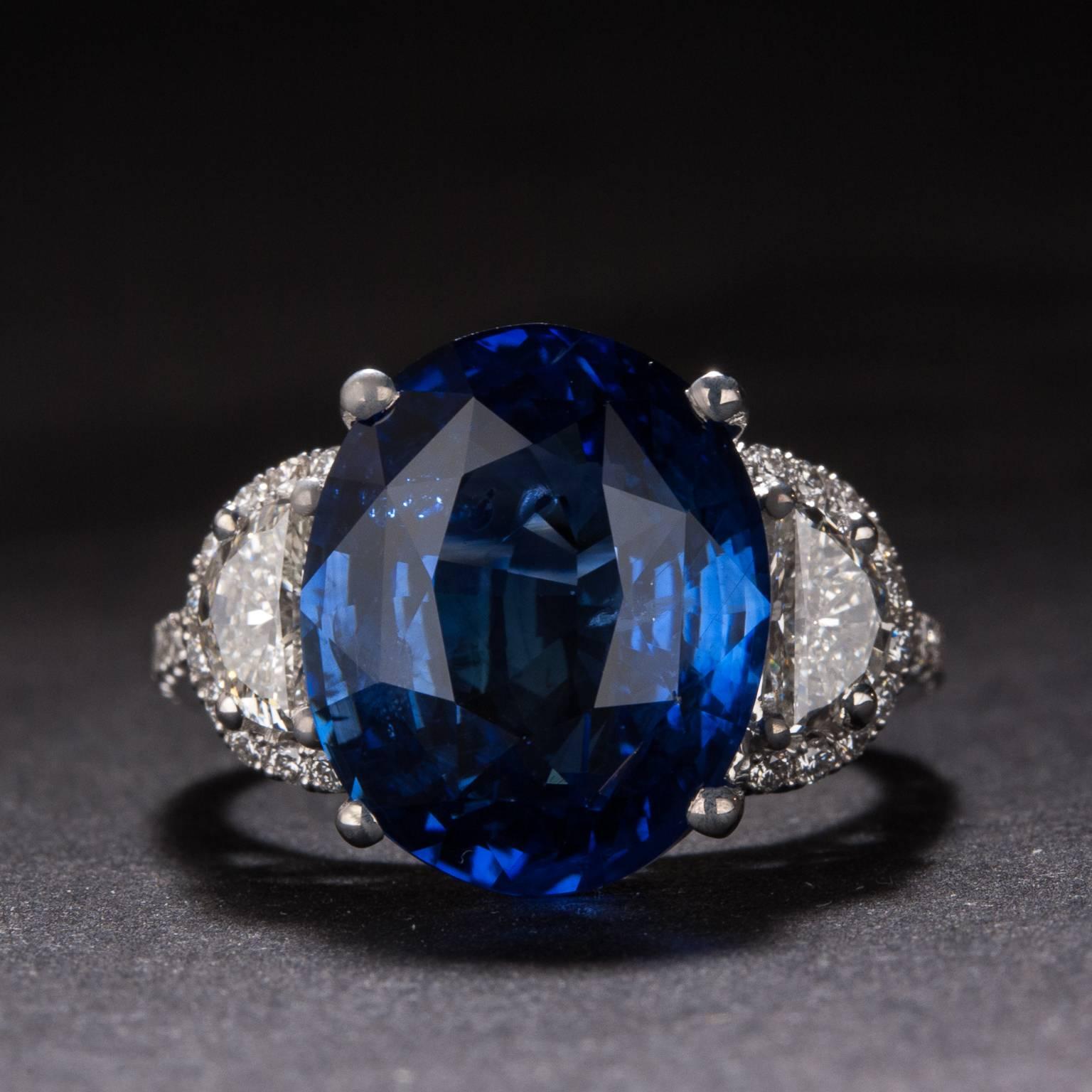 A gorgeous ring with an absolutely stunning 10.22 carat Sapphire at its center. The center sapphire is flanked by 1.01 total carats of diamonds and the mounting is crafted in 18k white gold.

This ring is size 6.5, although it may be sized to fit.