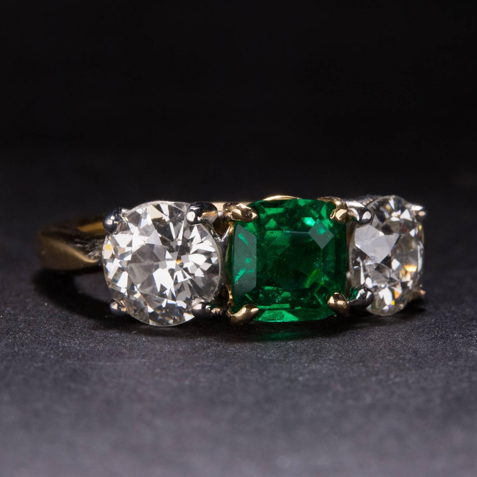 Contemporary 1.09 Carat Emerald Diamond Gold Three Stone Ring For Sale