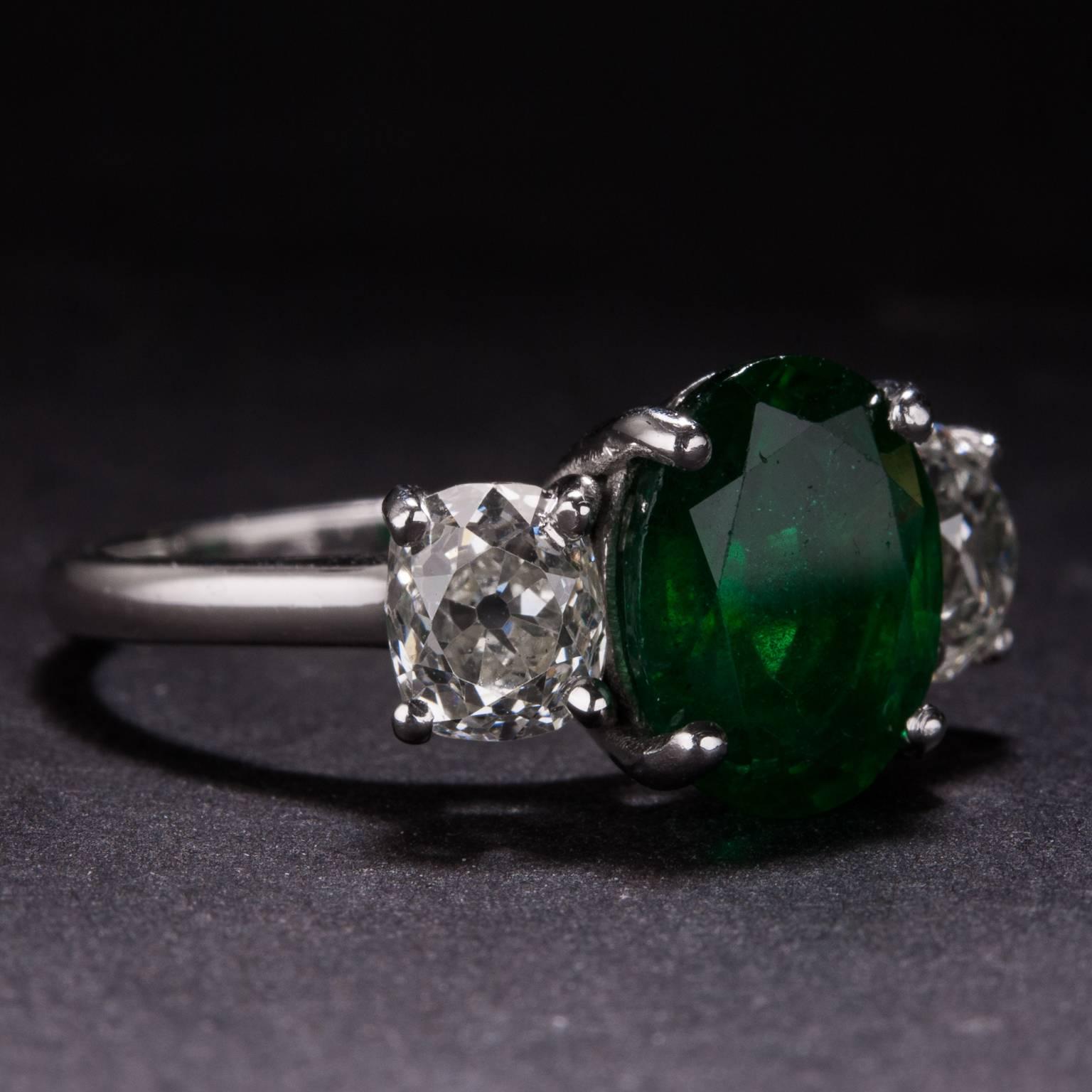 Contemporary 2.12 Carat Emerald Diamond Platinum Ring For Sale