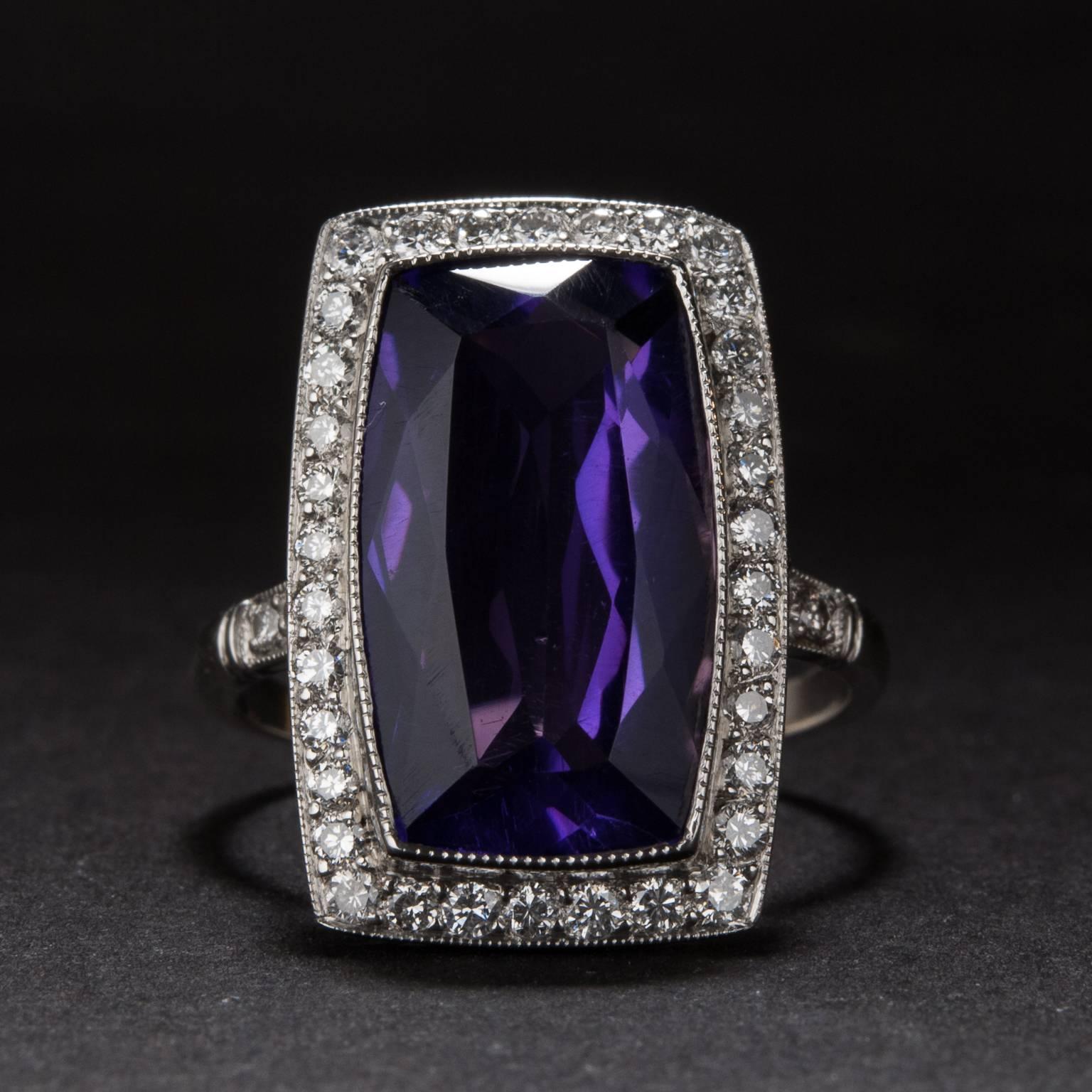 A stunning 5.95 carat amethyst with .65 total carats of diamond accents. This ring is crafted in platinum and is currently size 6.5.
