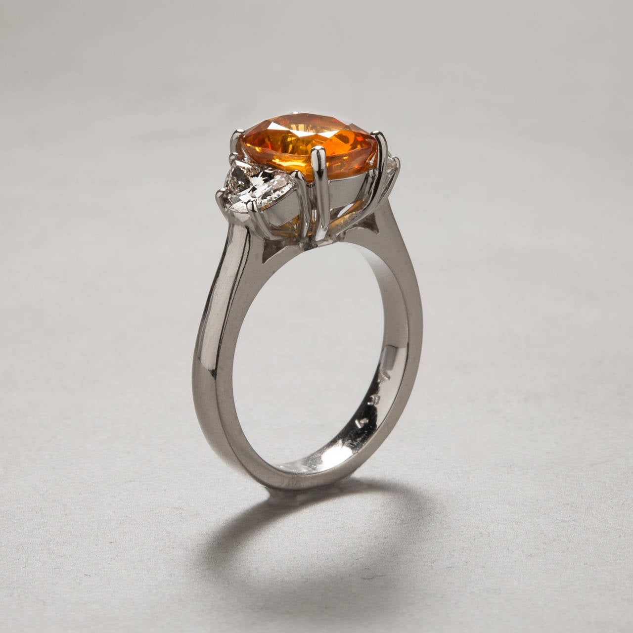 Contemporary 4.97ct Orange Sapphire, Diamond and White Gold Ring For Sale