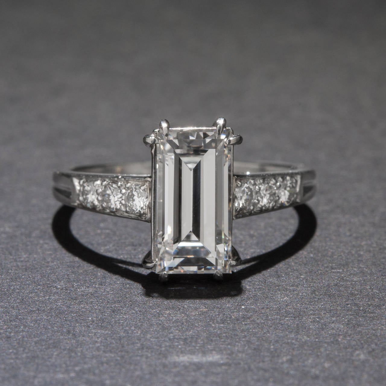 Dazzling and elegant, this 1.63 carat Emerald Cut Diamond ring from Tiffany & Co. makes quite an impression. The center diamond is GIA Certified 