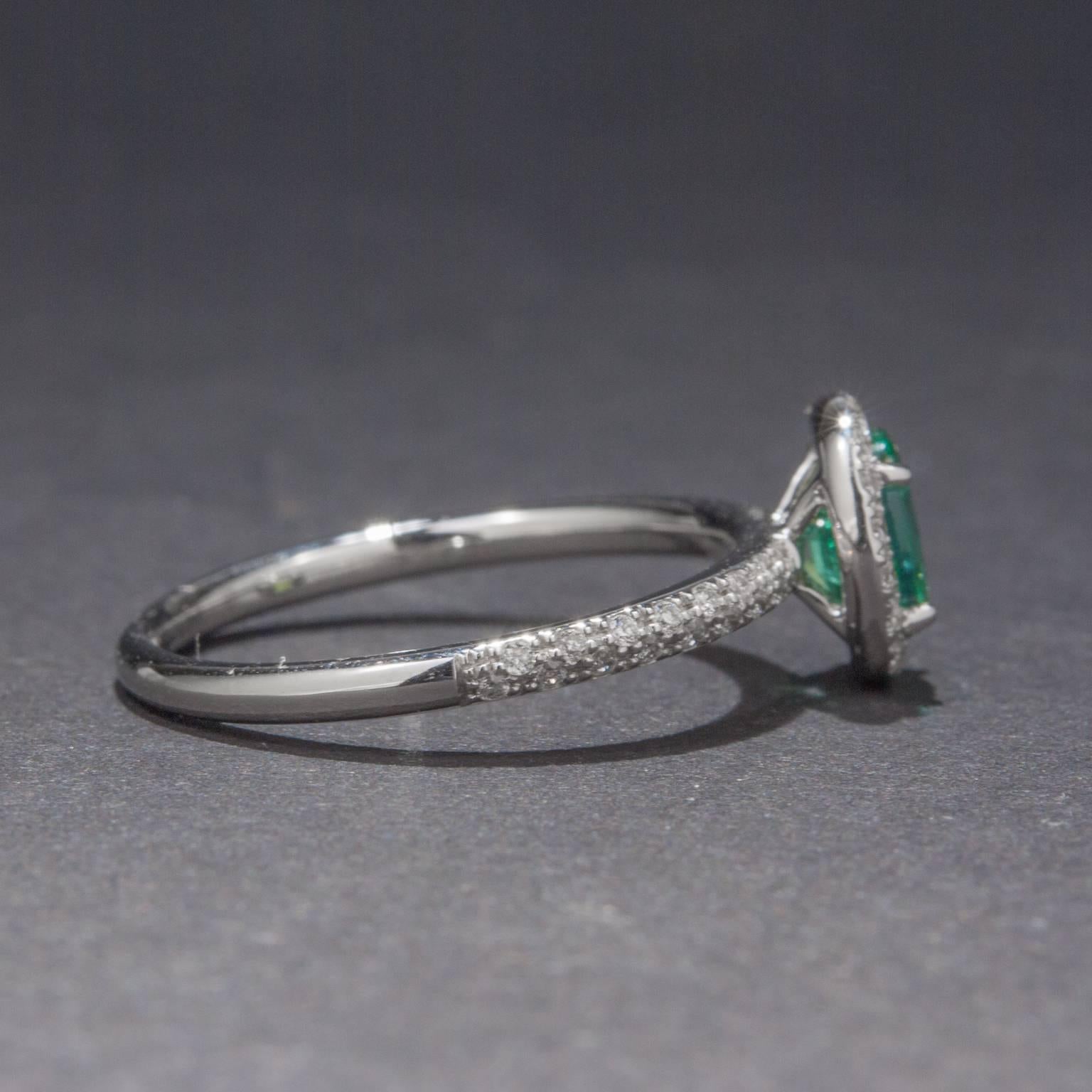 Contemporary .66 Carat Emerald and Diamond Ring For Sale