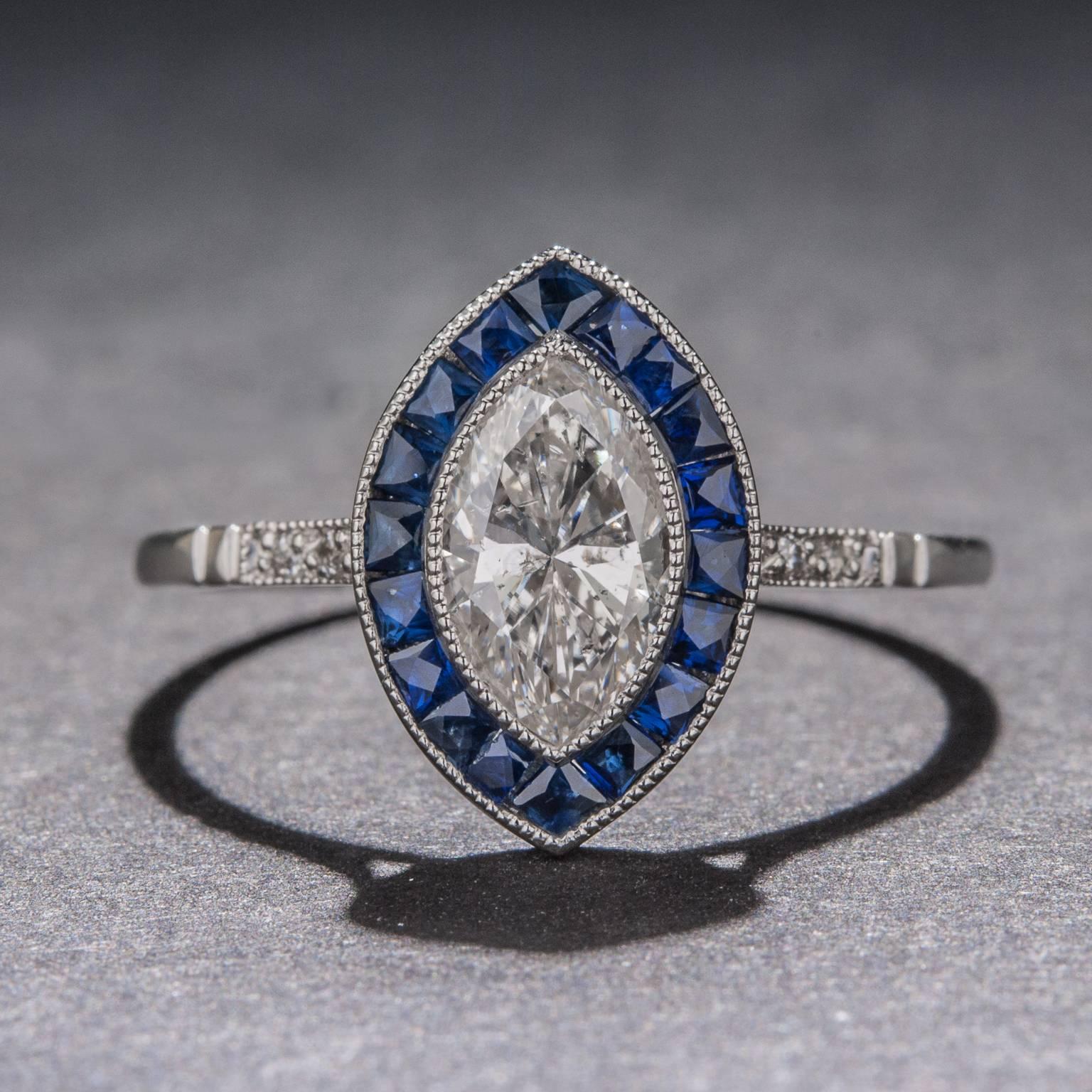Women's .85 Carat Marquise Diamond Sapphire Platinum Ring For Sale