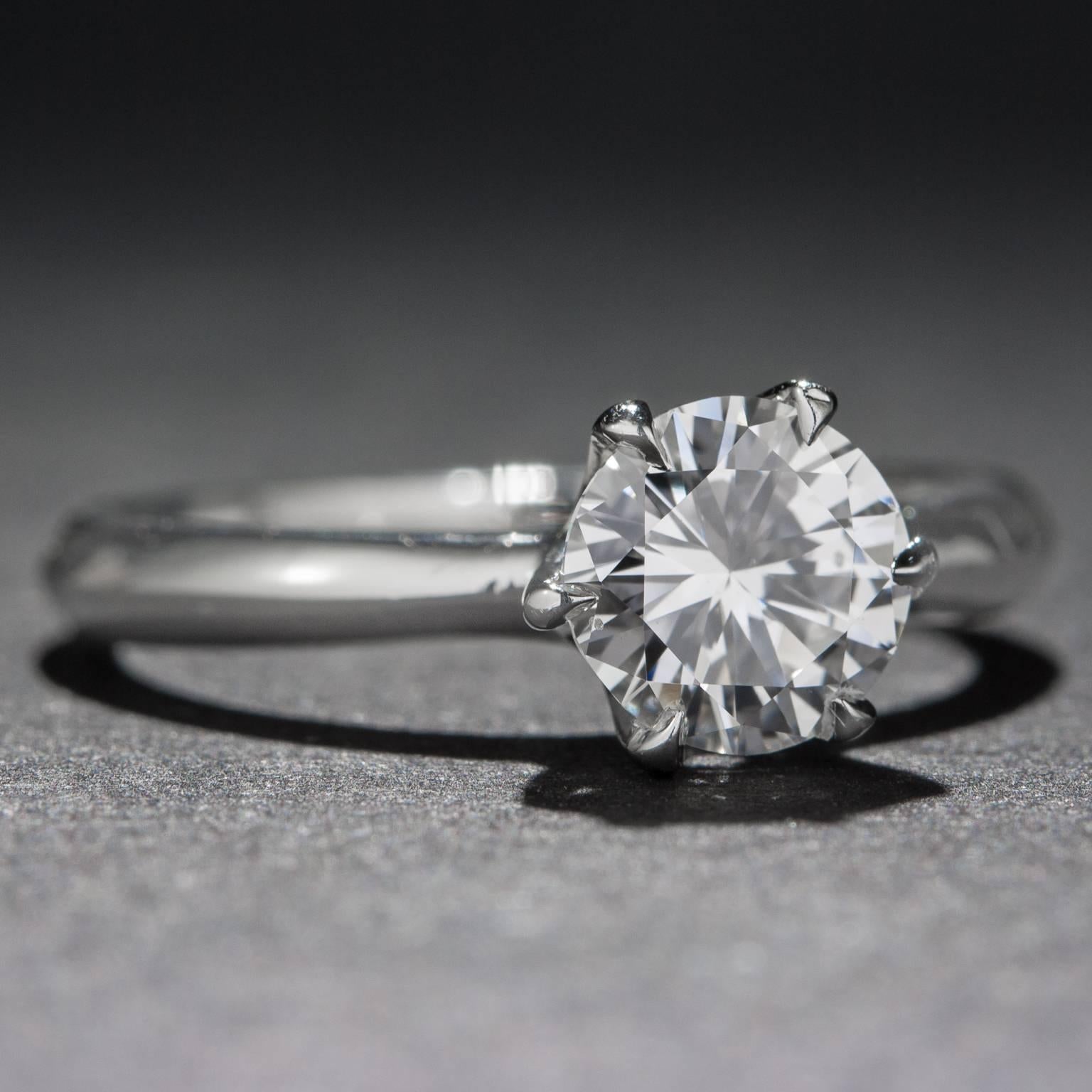 A simple yet stunning .91 carat solitaire diamond ring. The diamond is EGL certified 