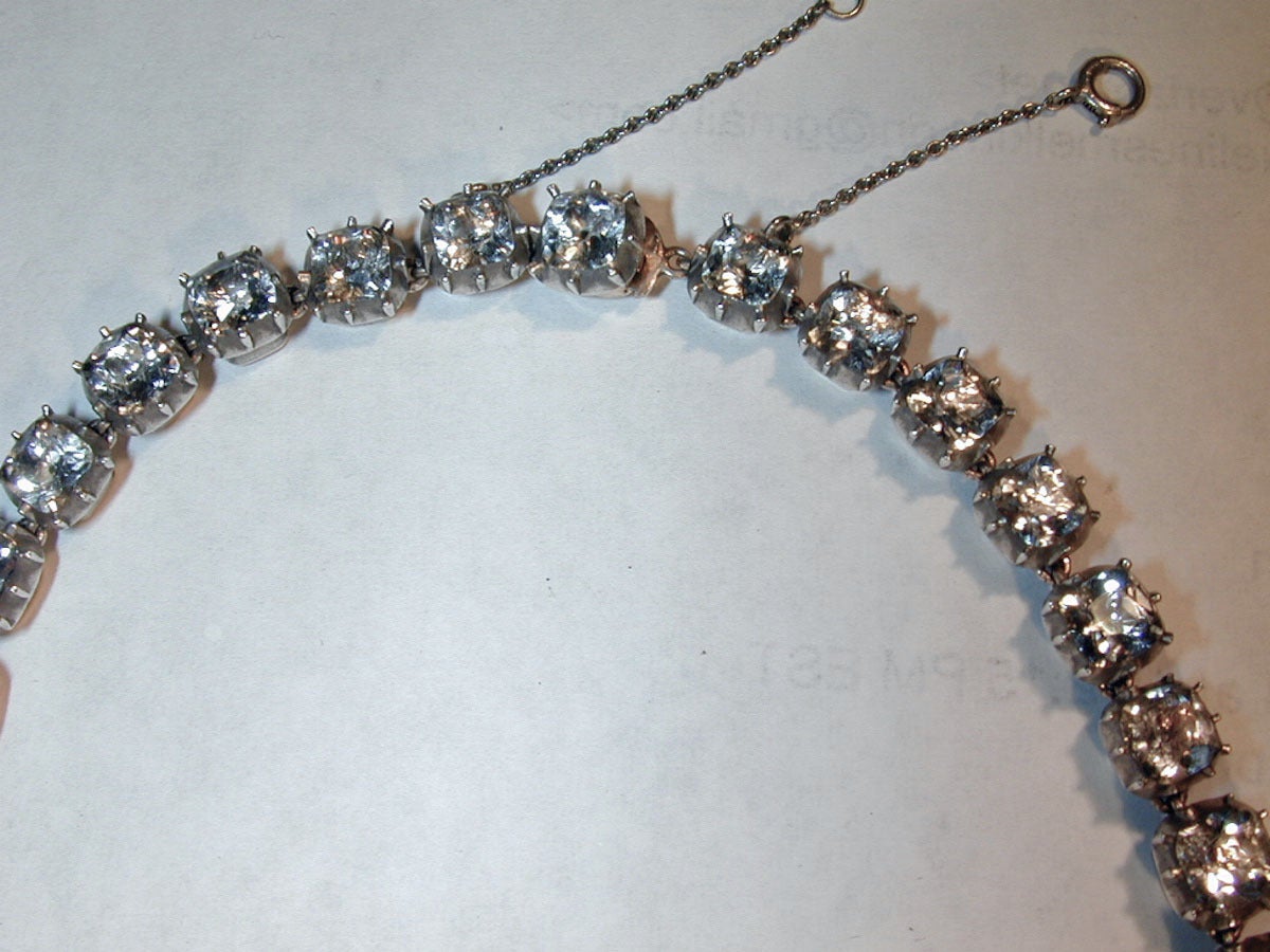 Exquisite Georgian rock crystal riviere set in 12K gold and silver. Rock Crystal is a natural, transparent quartz used in fine antique jewelry. This rare necklace is wonderful for evening wear and measures 15 3/8