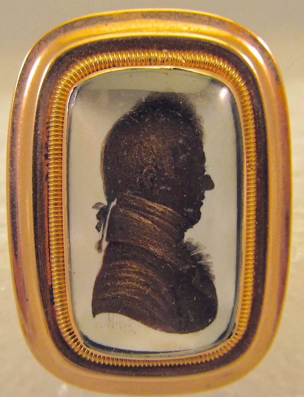 Rare Georgian silhouette pin of an English gentleman painted by the most famous of the British profile artists, John Miers.  He worked in the north of England from 1781 until he relocated to London in 1788. He set up business on the Strand where he