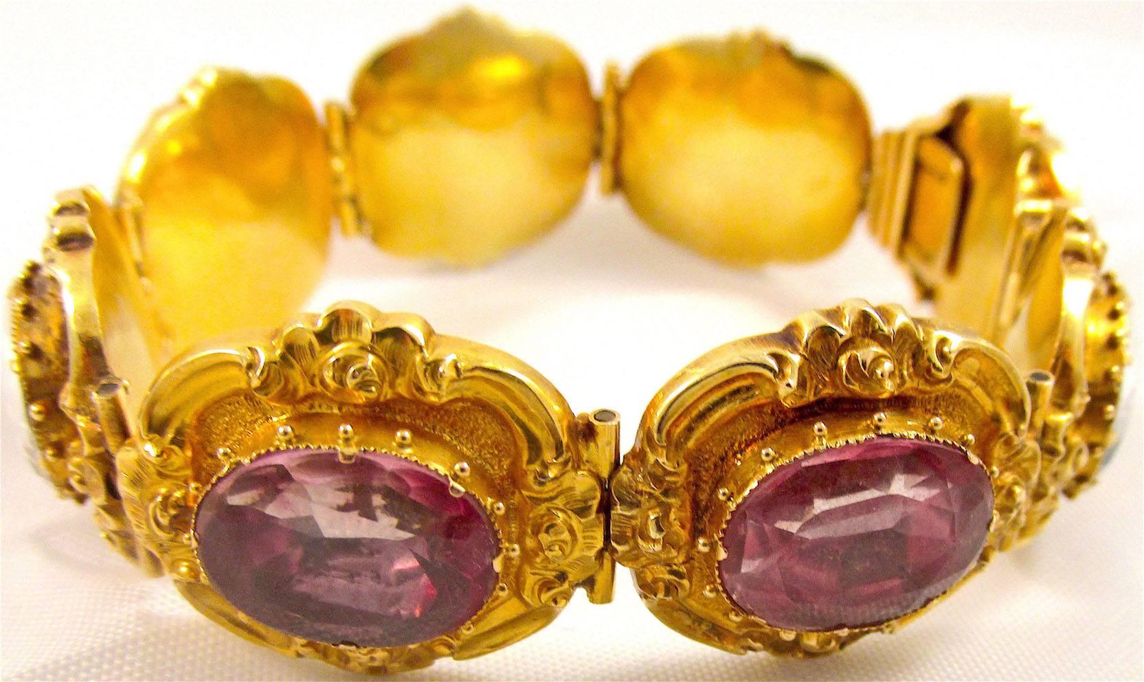 Exquisite Georgian 18K gold and multi-colored harlequin crystal bracelet. The bright colors of the crystals are enhanced by the elaberate gold work that surrounds them. The bracelet measures 7