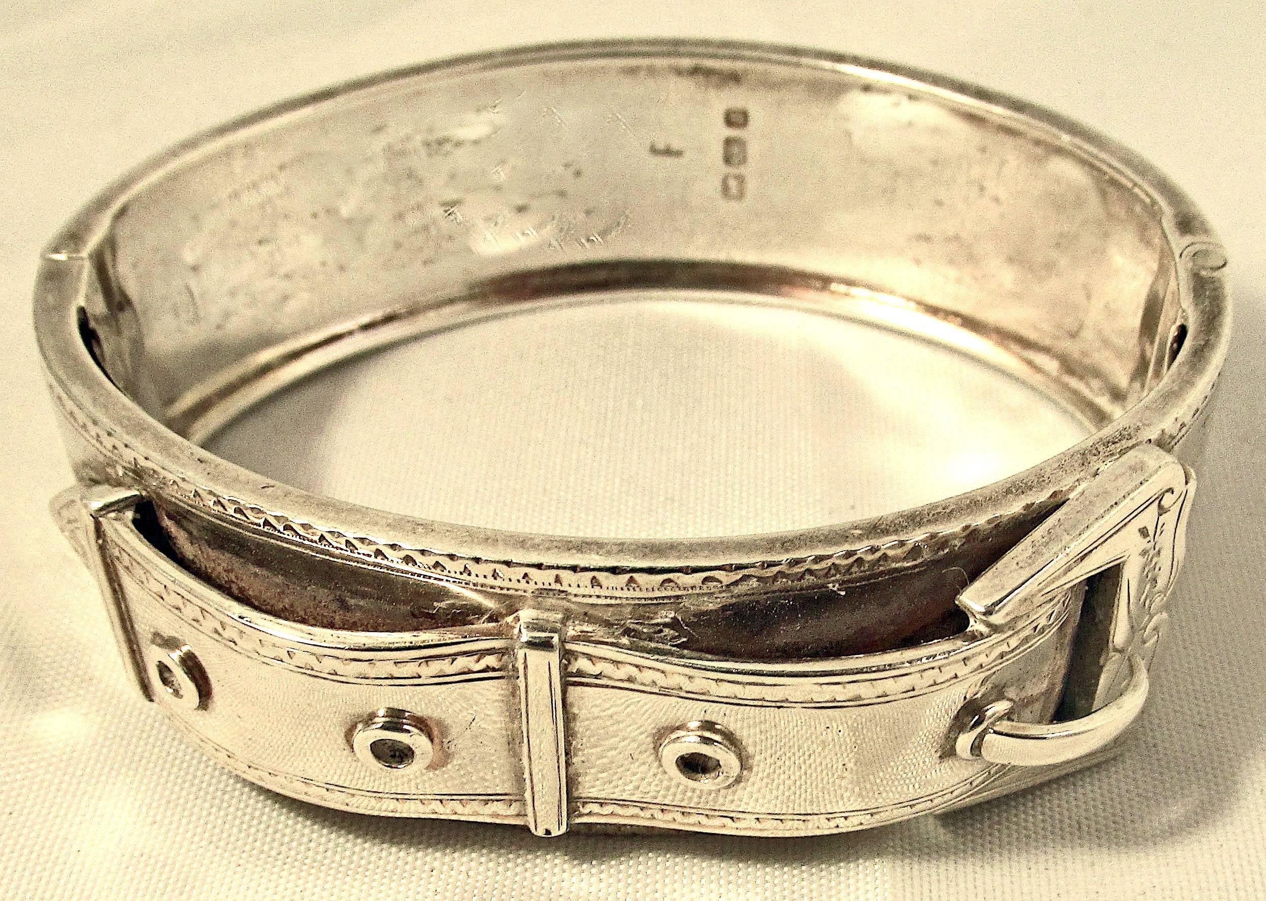 Victorian Sterling silver buckle bracelet with an engraved leaf design will be delightful to wear alone or paired with other bangles. Buckle bracelets were very popular in Victorian England as the Queen wore the order of the garter on her arm. 