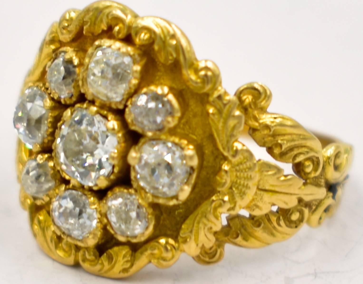Fantastic Georgian diamond cluster ring in an elaborate 18K gold setting of leaves and shells. A truly spectacular ring, it is a size 5 3/4 and can be resized larger. An unusual, beautiful and very special ring.