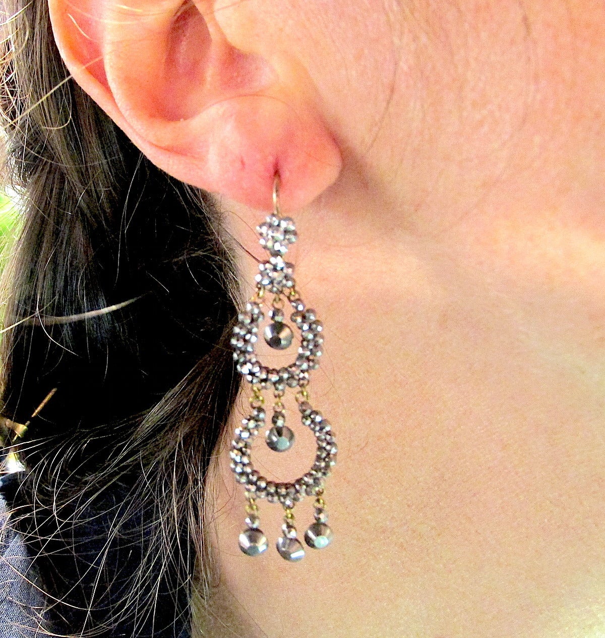 Sparkling Victorian cut steel earrings with two circles and five drops. Their movement will glitter and glisten with every movement. Fun to wear day or night. The earrings measure 2