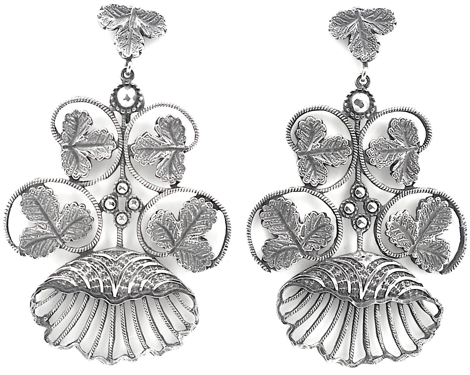 Victorian shell and leaf motif earrings in sterling silver. Emblematic of the Victorian interest in nature these earrings will be delightful to wear day or night. 