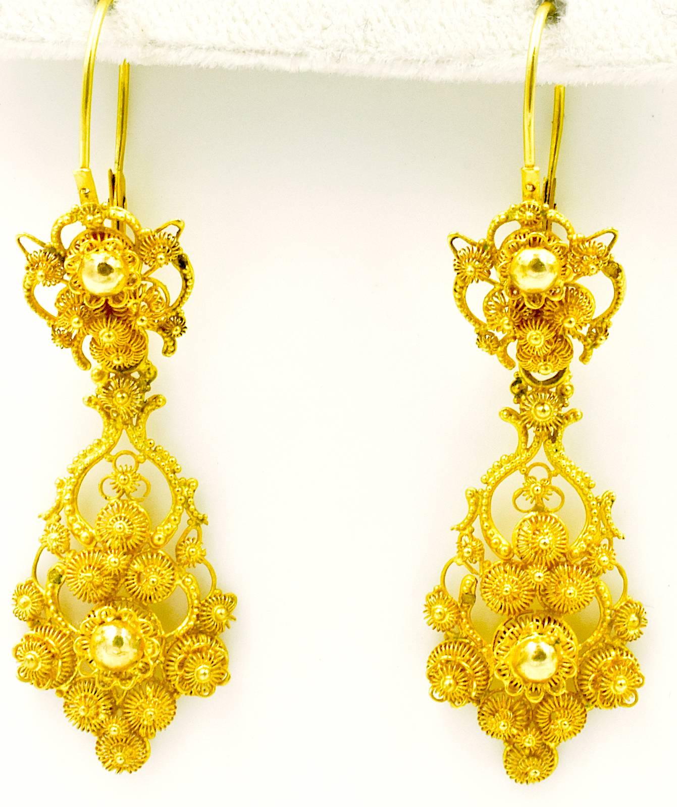 Fabulous cannetille 18K gold earrings made in Amsterdam by Gerdes & Pisort in the 1840's. Cannetille jewelry was based on a style of fabric embroidery that was adapted to precious metal. It is made with fine, twisted wire or thin sheets of gold.